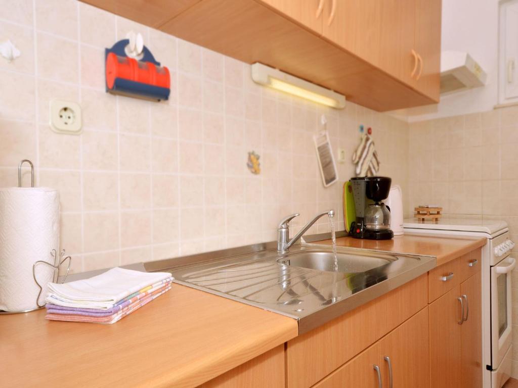 Kuchyňa alebo kuchynka v ubytovaní Apartment NADA