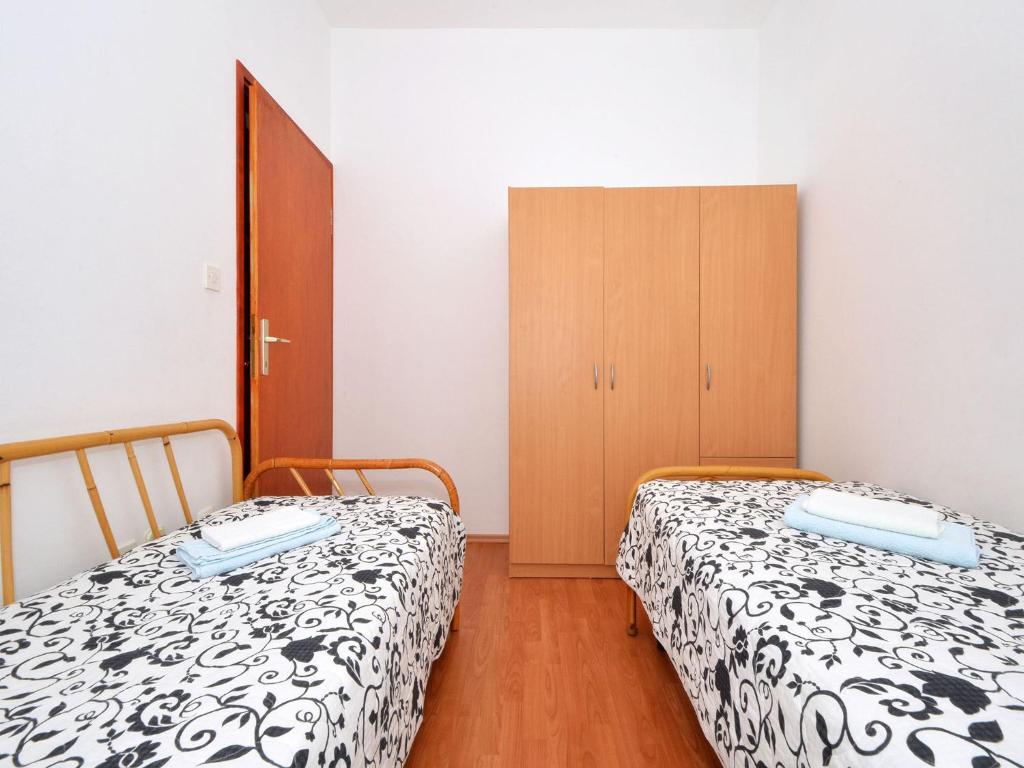 Posteľ alebo postele v izbe v ubytovaní Apartment NADA
