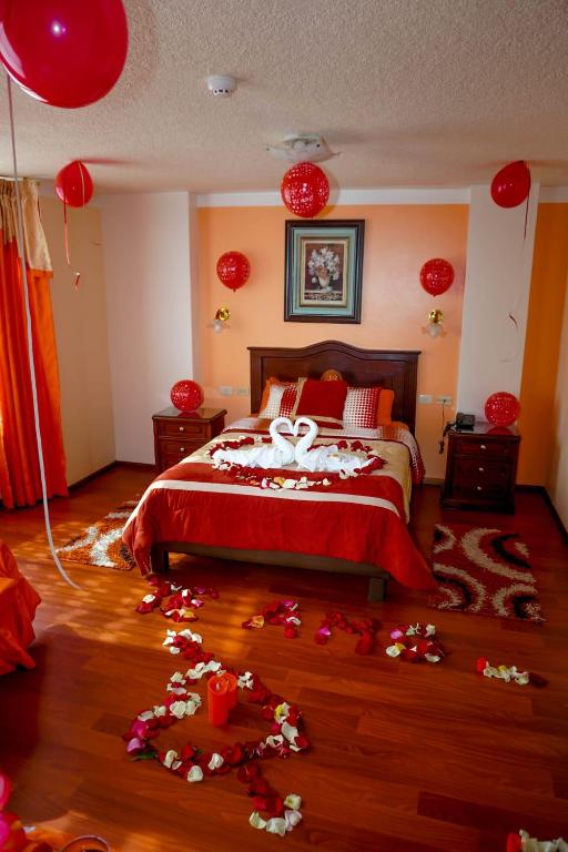 Postel nebo postele na pokoji v ubytování Hotel Los Ilinizas