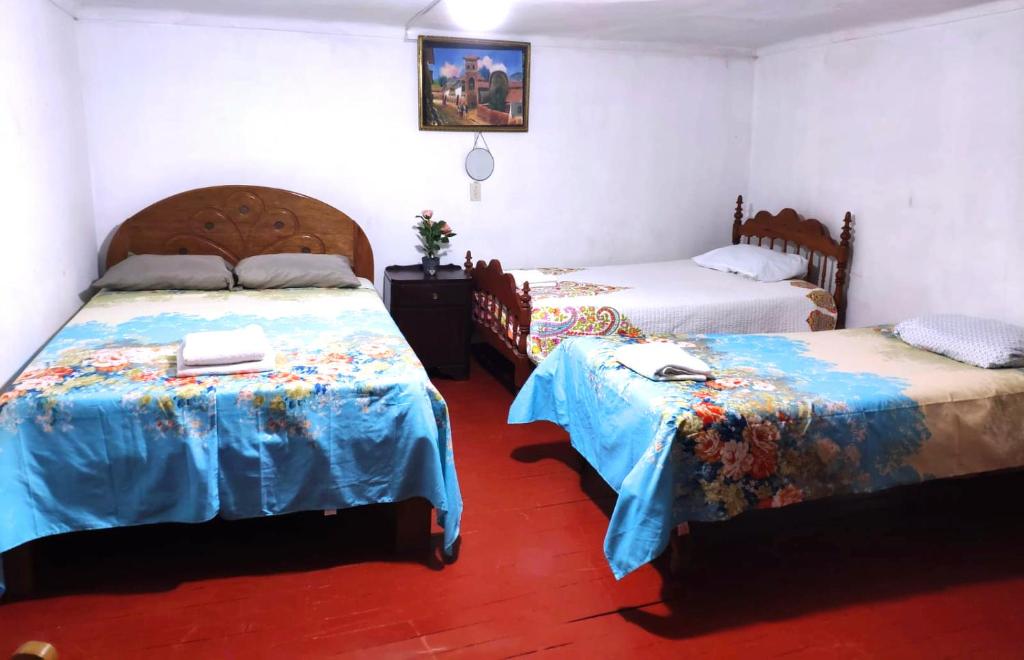 Letto o letti in una camera di Cuzco Central Hostel