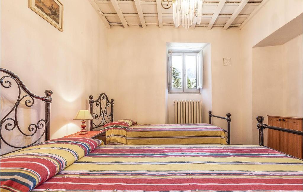 A bed or beds in a room at Palazzo 1P