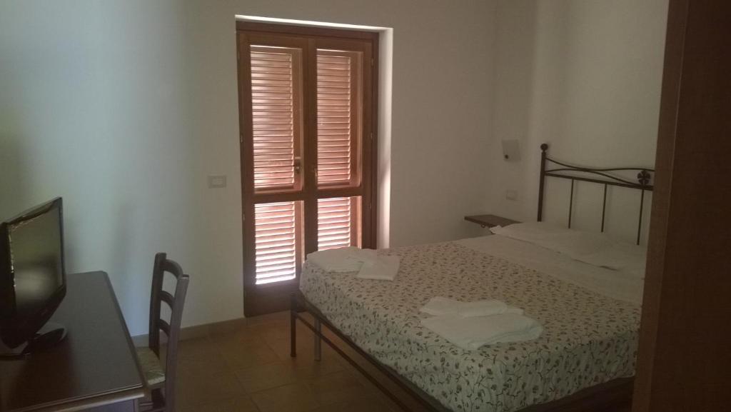 Posteľ alebo postele v izbe v ubytovaní Agriturismo Monte dell'Olmo