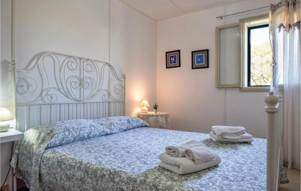 A bed or beds in a room at Villa Andrea