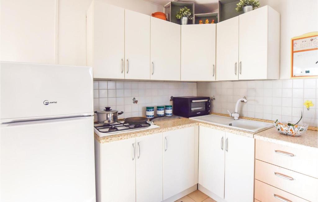 A kitchen or kitchenette at Villa Andrea
