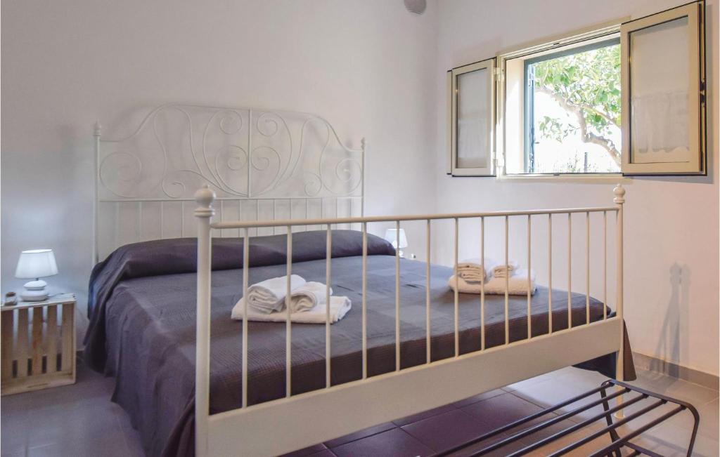 A bed or beds in a room at Villa Andrea