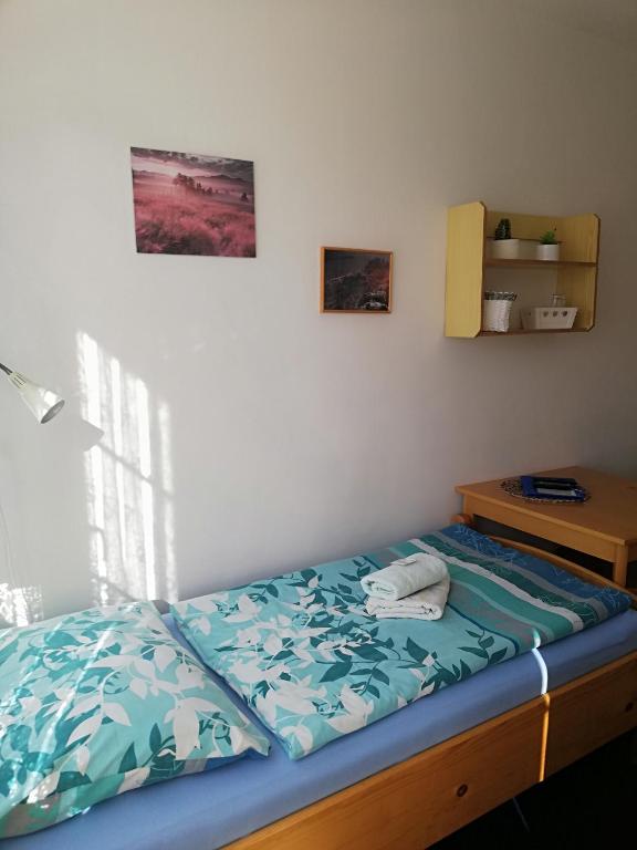 Postel nebo postele na pokoji v ubytování Pension Pastis