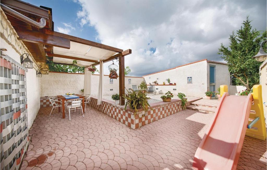Patio alebo iná vonkajšia časť ubytovania La Mimosa
