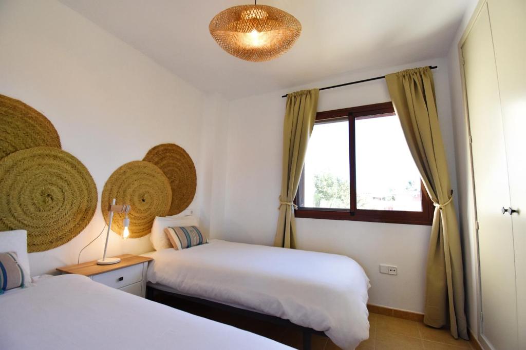 Posteľ alebo postele v izbe v ubytovaní Marinas Sunset - Tu Dúplex con Solarium Privado!
