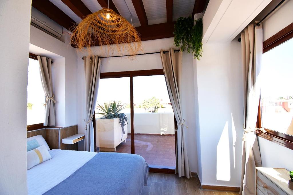Posteľ alebo postele v izbe v ubytovaní Marinas Sunset - Tu Dúplex con Solarium Privado!