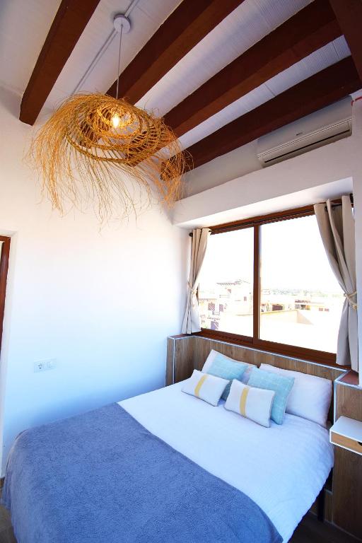 Posteľ alebo postele v izbe v ubytovaní Marinas Sunset - Tu Dúplex con Solarium Privado!