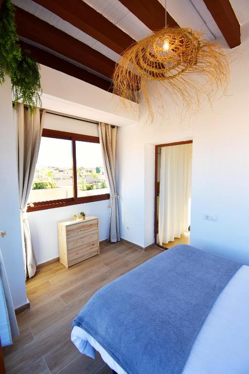 Posteľ alebo postele v izbe v ubytovaní Marinas Sunset - Tu Dúplex con Solarium Privado!