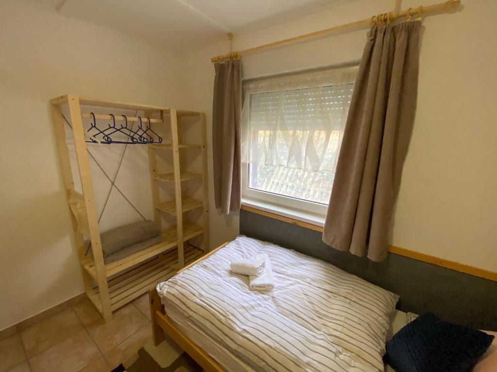 Postel nebo postele na pokoji v ubytování Regina Ranch