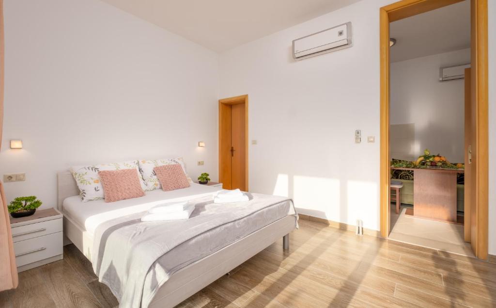 Posteľ alebo postele v izbe v ubytovaní Studio Apartment Brigita
