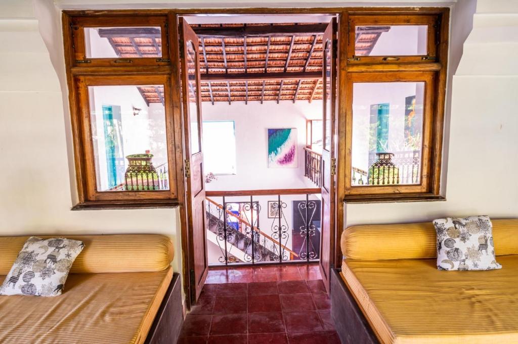 Posezení v ubytování Island House Goa