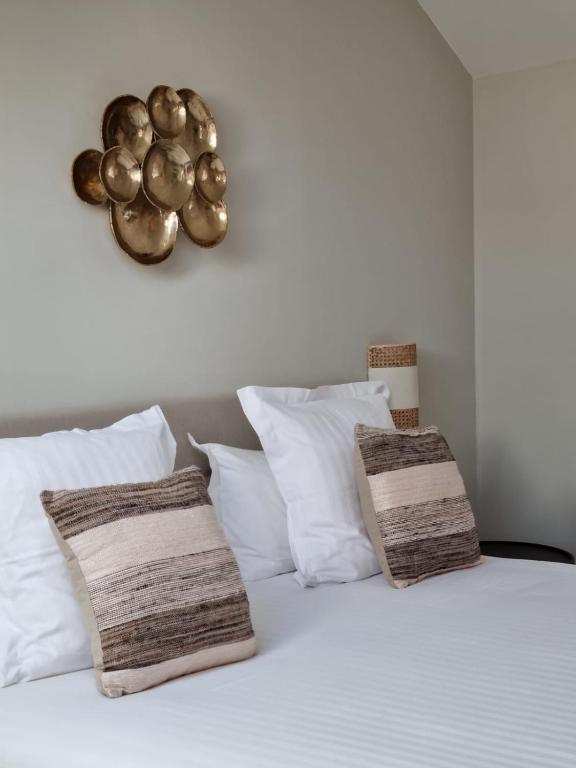 Postel nebo postele na pokoji v ubytování Hôtel Le Chantilly