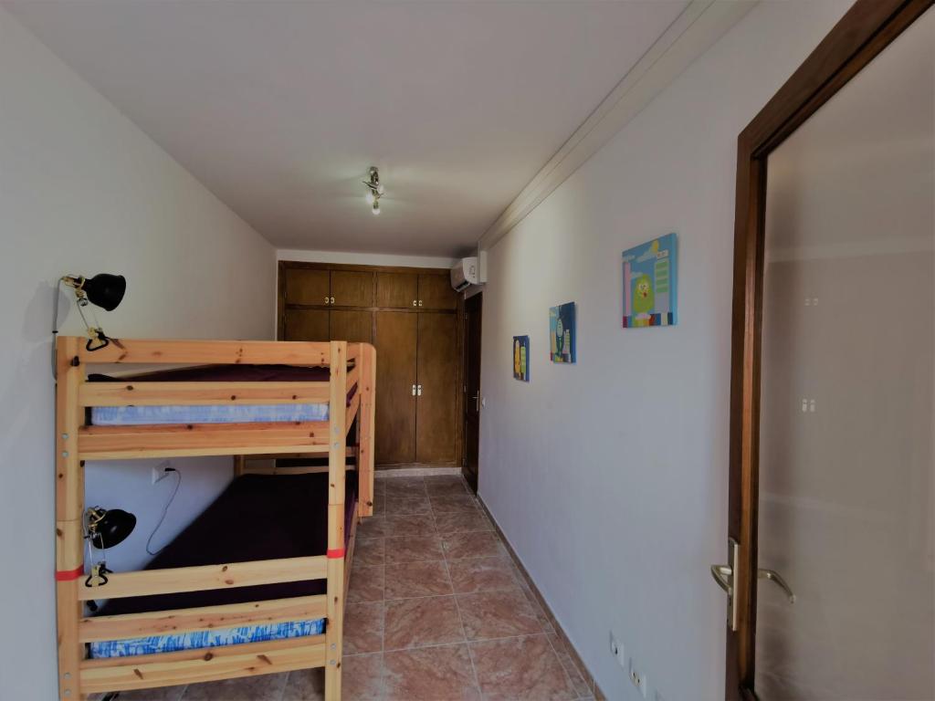 Кровать или кровати в номере Cala Mesquida
