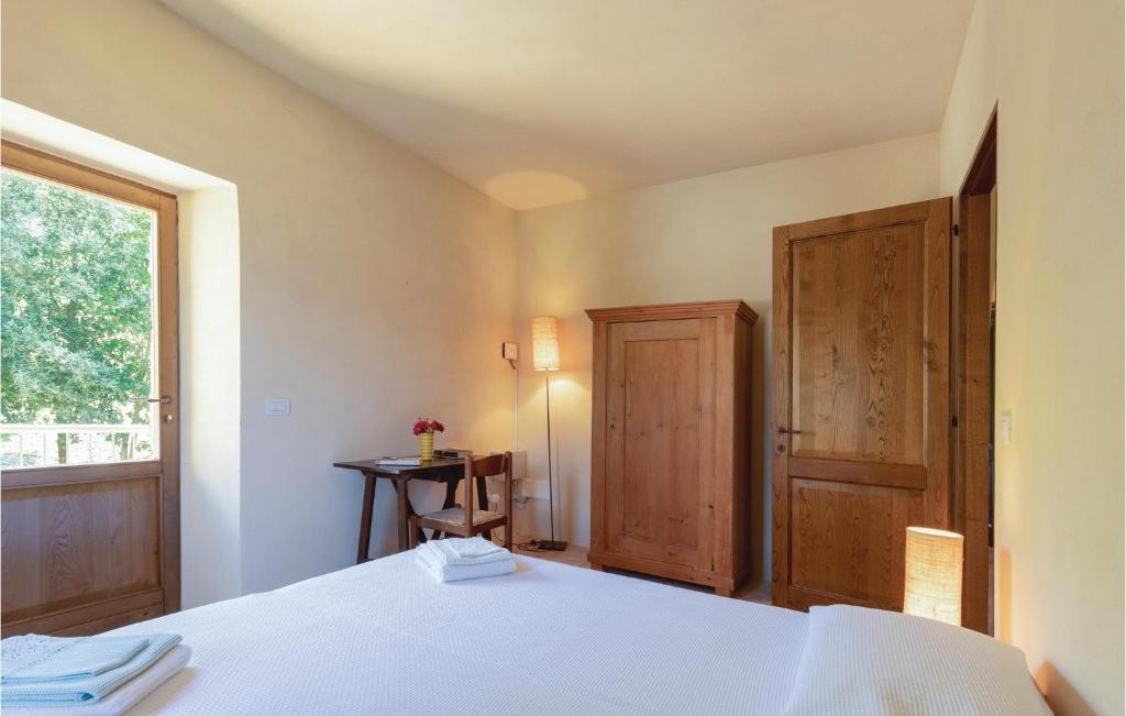 A bed or beds in a room at Umbriaverde 2