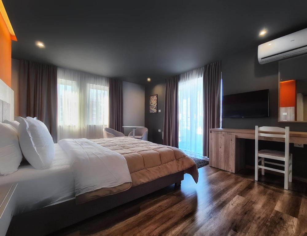 Voodi või voodid majutusasutuse Hotel Enkelana toas
