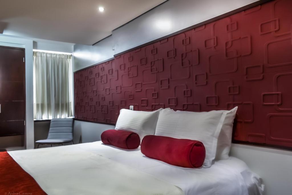 Postel nebo postele na pokoji v ubytování Hotel Florencia Plaza