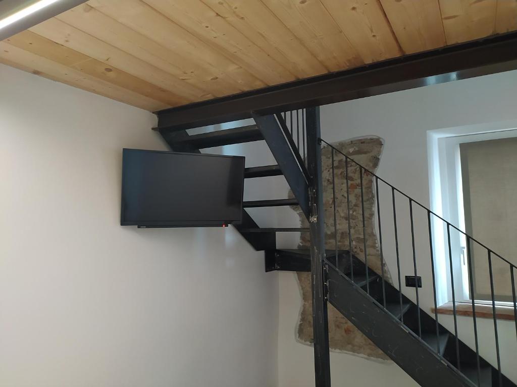TV a/nebo společenská místnost v ubytování Casa Mantel Holiday Home Panoramic view in Langhe