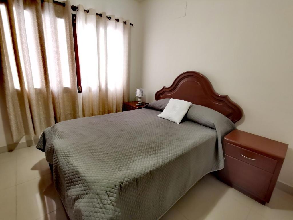 Cama o camas de una habitación en Casa de huespedes San Jorge