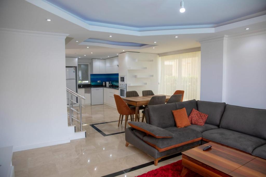 A seating area at Sunrise hill villa with private pool