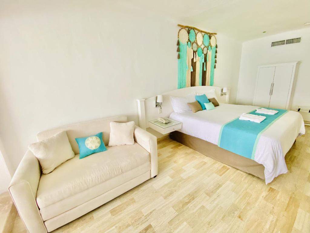 Postel nebo postele na pokoji v ubytování Cyan Cancun Resort & Spa
