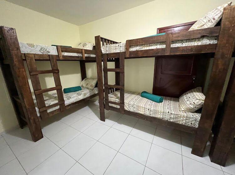 Hostel flor do Caribeにあるベッド