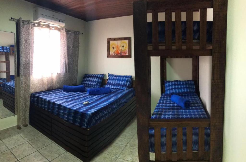 Hostel flor do Caribeにあるベッド