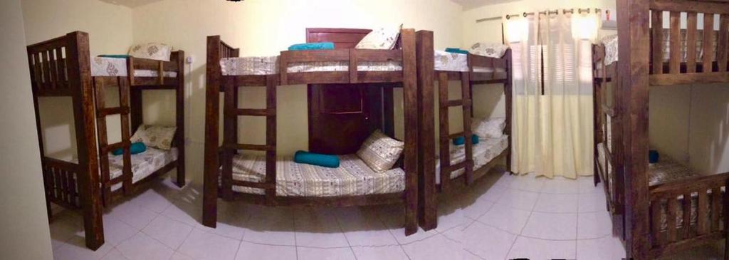 Hostel flor do Caribeにあるベッド