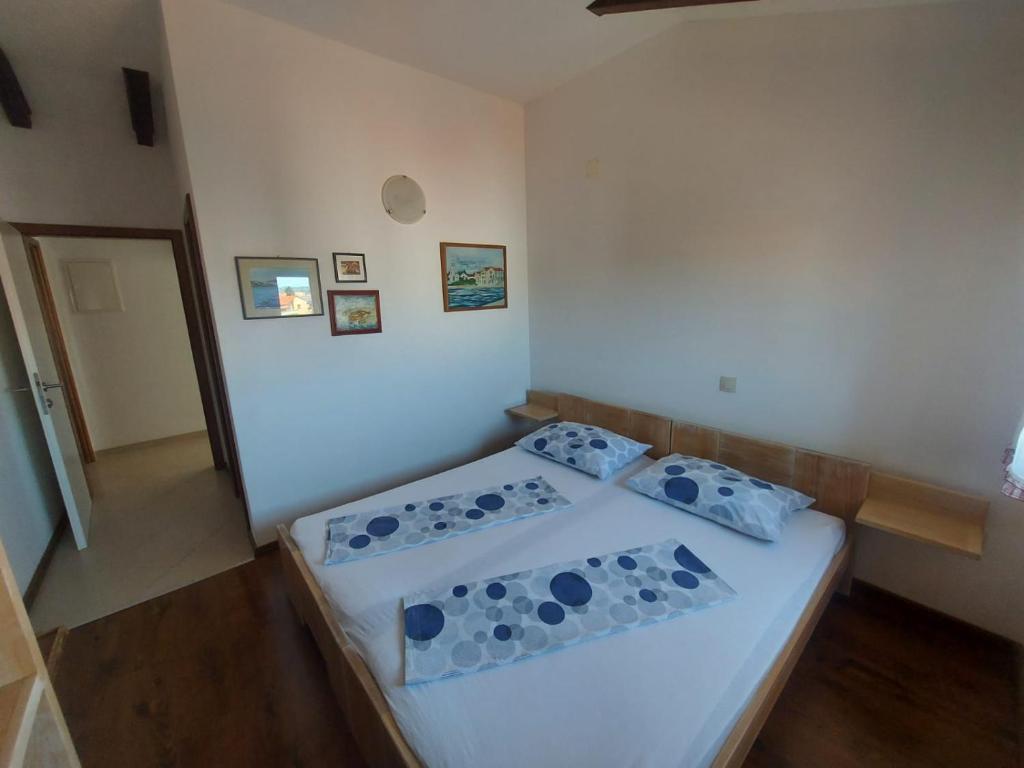 Posteľ alebo postele v izbe v ubytovaní Apartments Božena