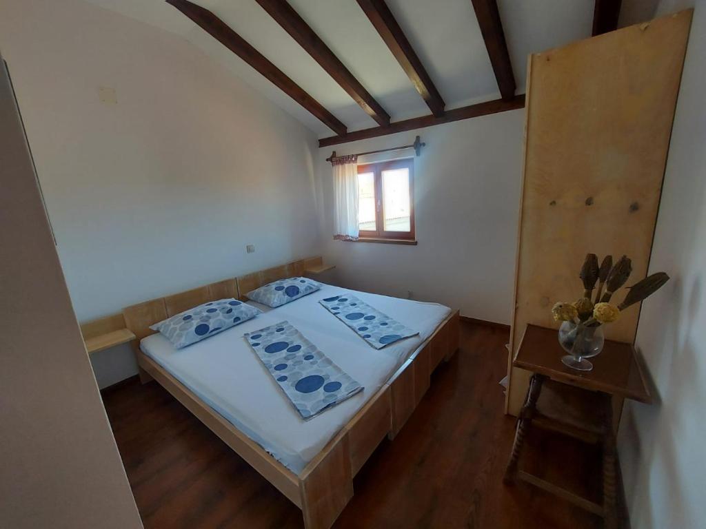Posteľ alebo postele v izbe v ubytovaní Apartments Božena