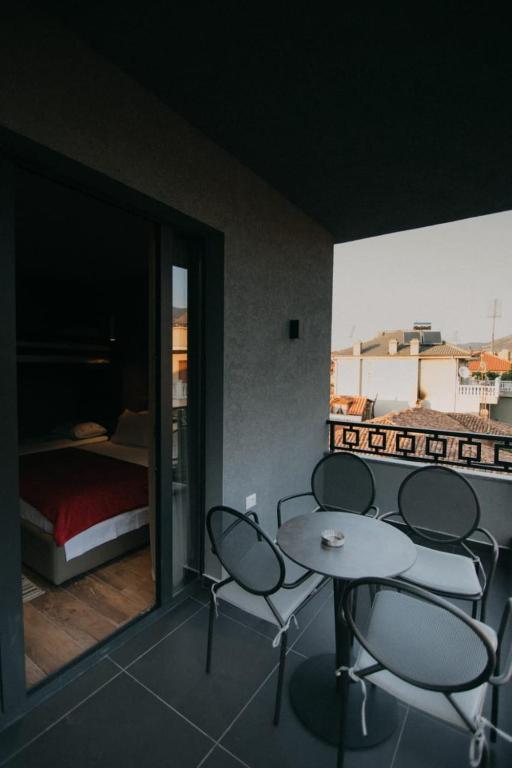 Postel nebo postele na pokoji v ubytování Mergan Hotel