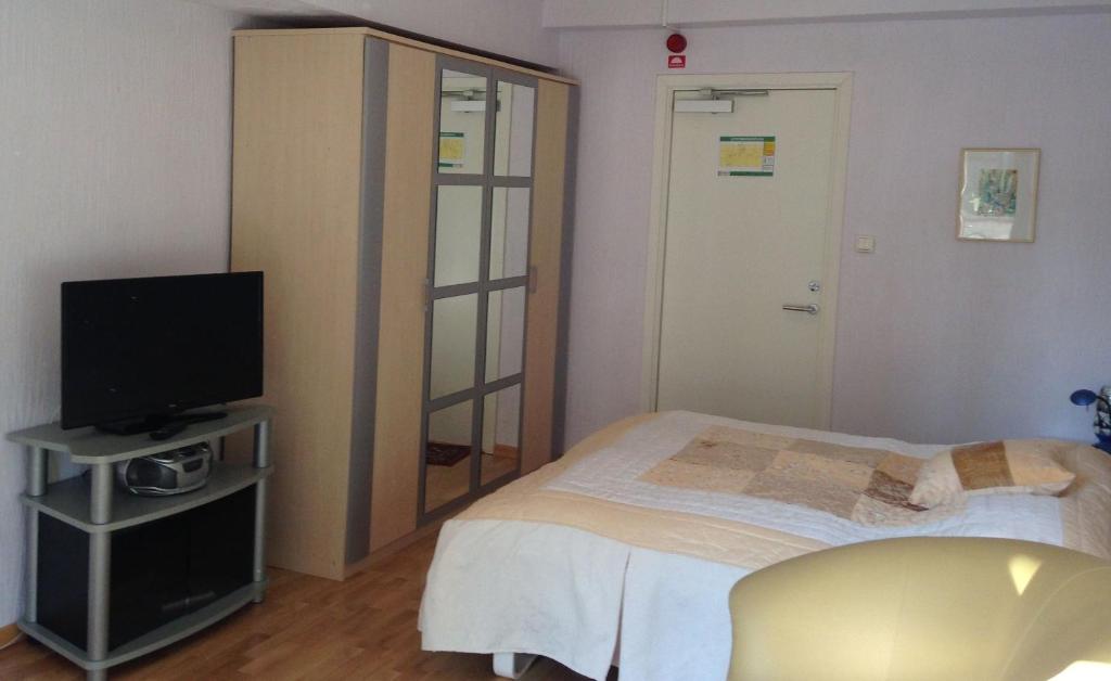 Postel nebo postele na pokoji v ubytování Solrosen i Simrishamn - Österlen