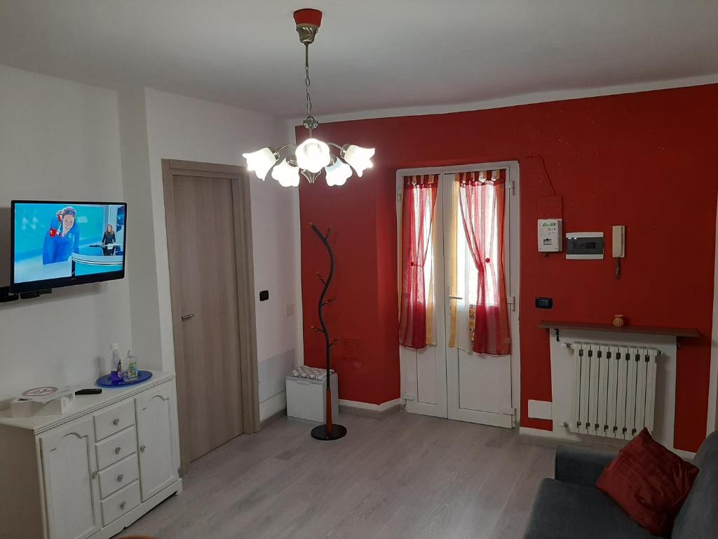 Televízia a/alebo spoločenská miestnosť v ubytovaní House Vittone Venaria Reale