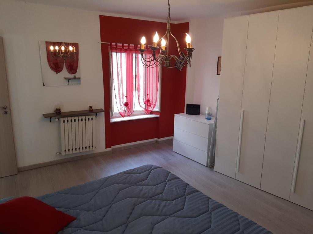 Posteľ alebo postele v izbe v ubytovaní House Vittone Venaria Reale