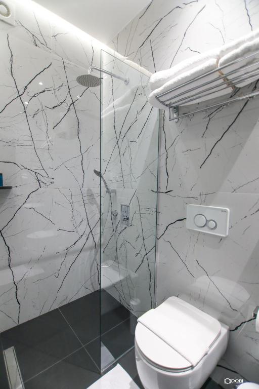 Koupelna v ubytování Mergan Hotel
