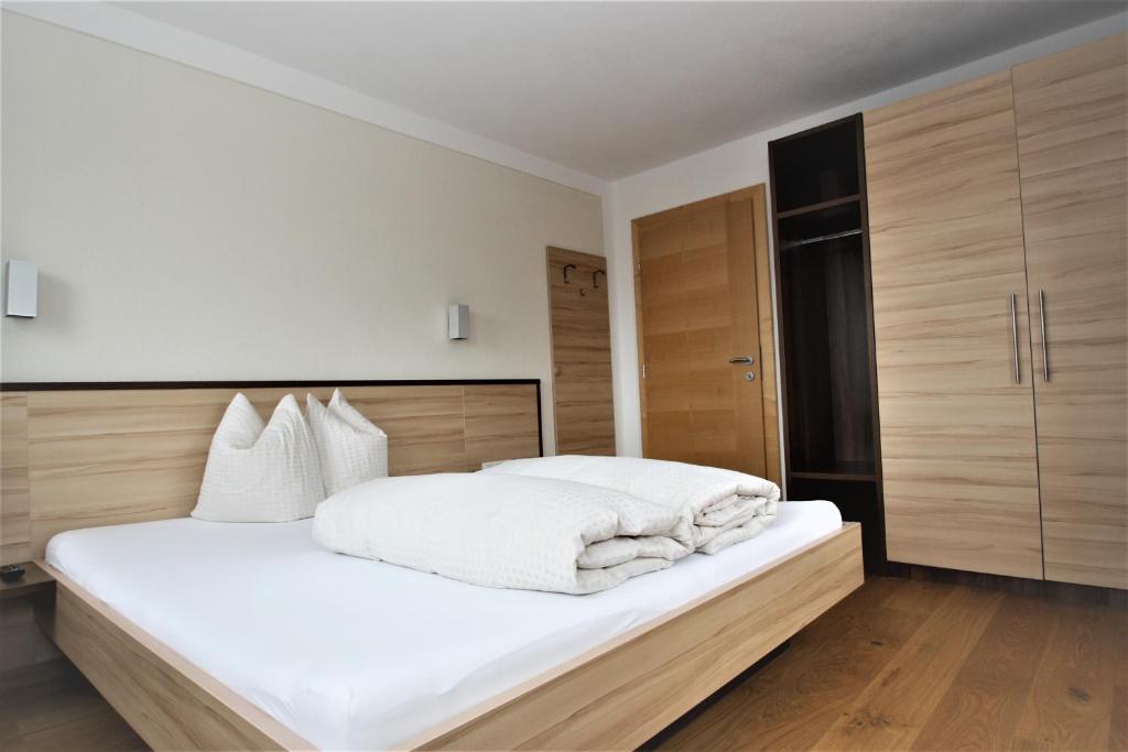 Posteľ alebo postele v izbe v ubytovaní Apart Berghof
