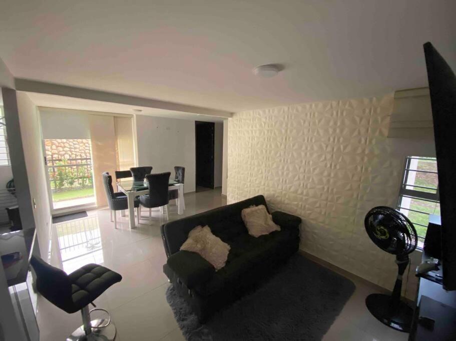 Posezení v ubytování Espectacular apartamento totalmente amoblado