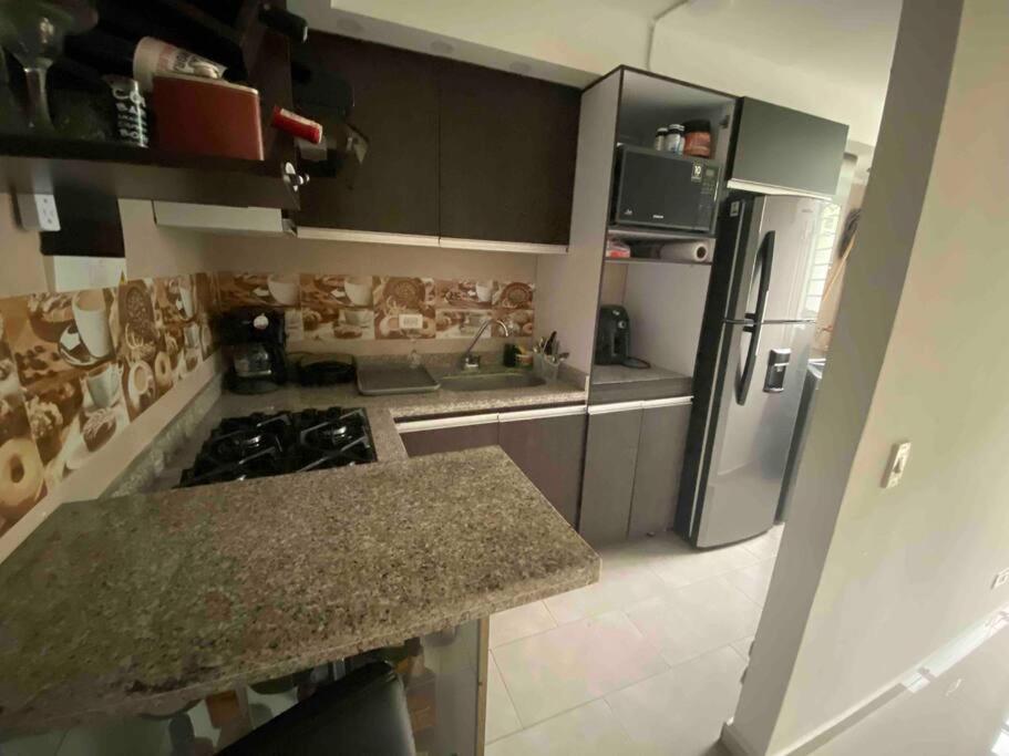 Kuchyň nebo kuchyňský kout v ubytování Espectacular apartamento totalmente amoblado