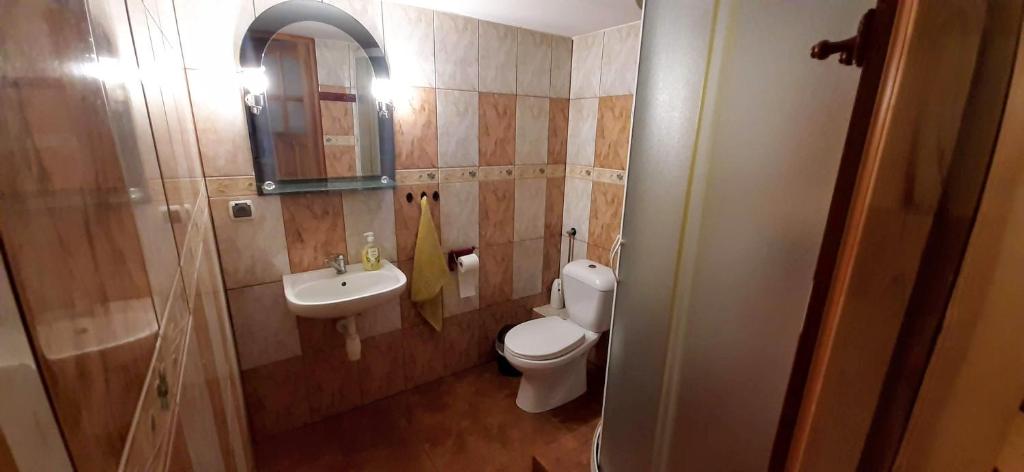 Kúpeľňa v ubytovaní Orzechowy Dworek