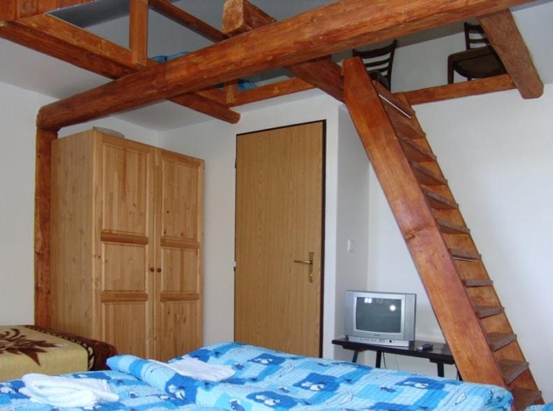 Postel nebo postele na pokoji v ubytování Chata Artur