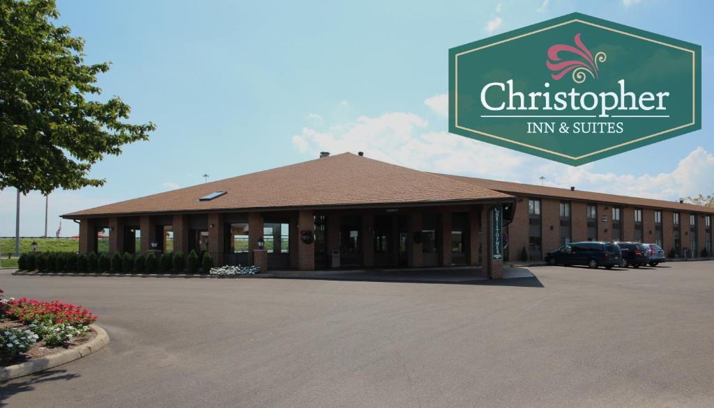 a building with a sign that reads christ superstar inn and suites at Christopher Inn and Suites in Chillicothe