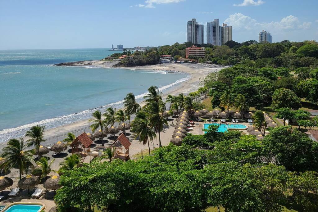 an aerial view of a beach with a resort at Fantastic Beach condo with pool and mountain views in Nueva Gorgona