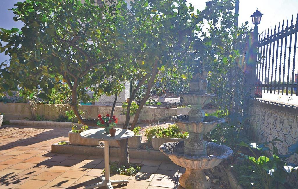 A garden outside 7 Bedroom Lovely Home In Santa Susanna