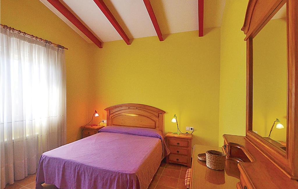 A bed or beds in a room at 7 Bedroom Lovely Home In Santa Susanna