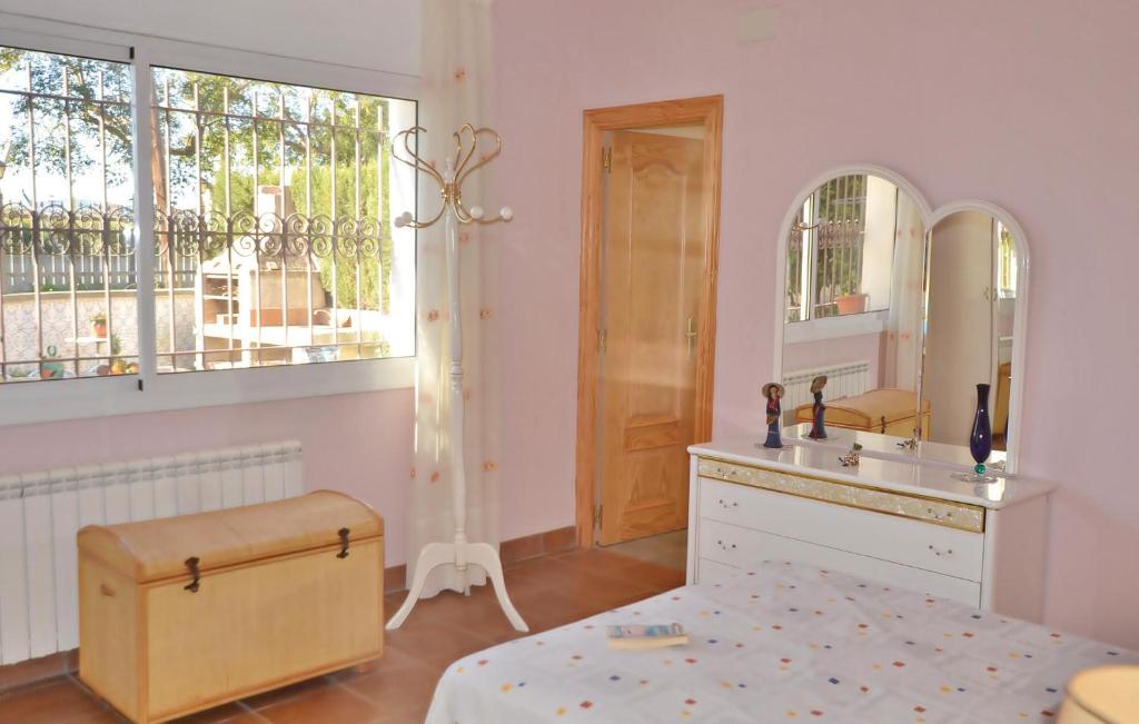 A bed or beds in a room at 7 Bedroom Lovely Home In Santa Susanna