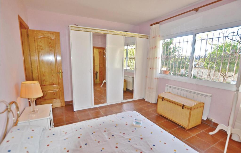 A bed or beds in a room at 7 Bedroom Lovely Home In Santa Susanna