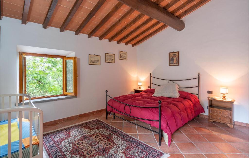 A bed or beds in a room at Awesome Home In Dicomano Fi