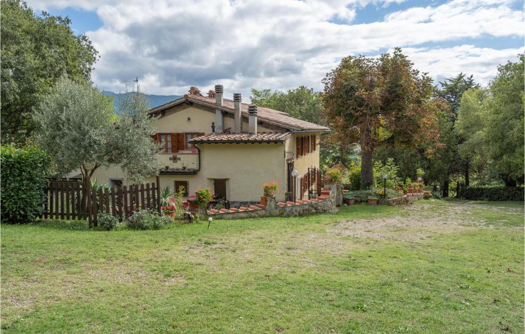 A garden outside Awesome Home In Dicomano Fi